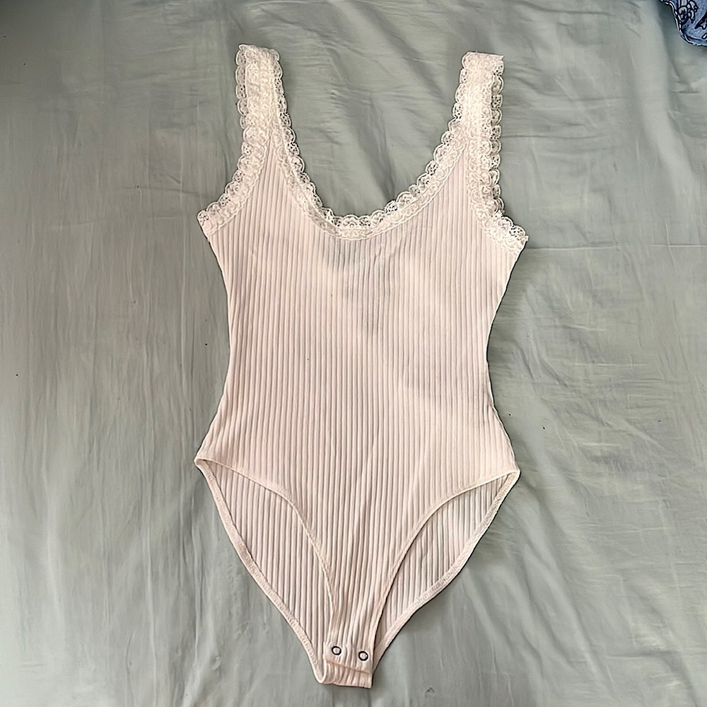 White ribbed bodysuit with lace straps